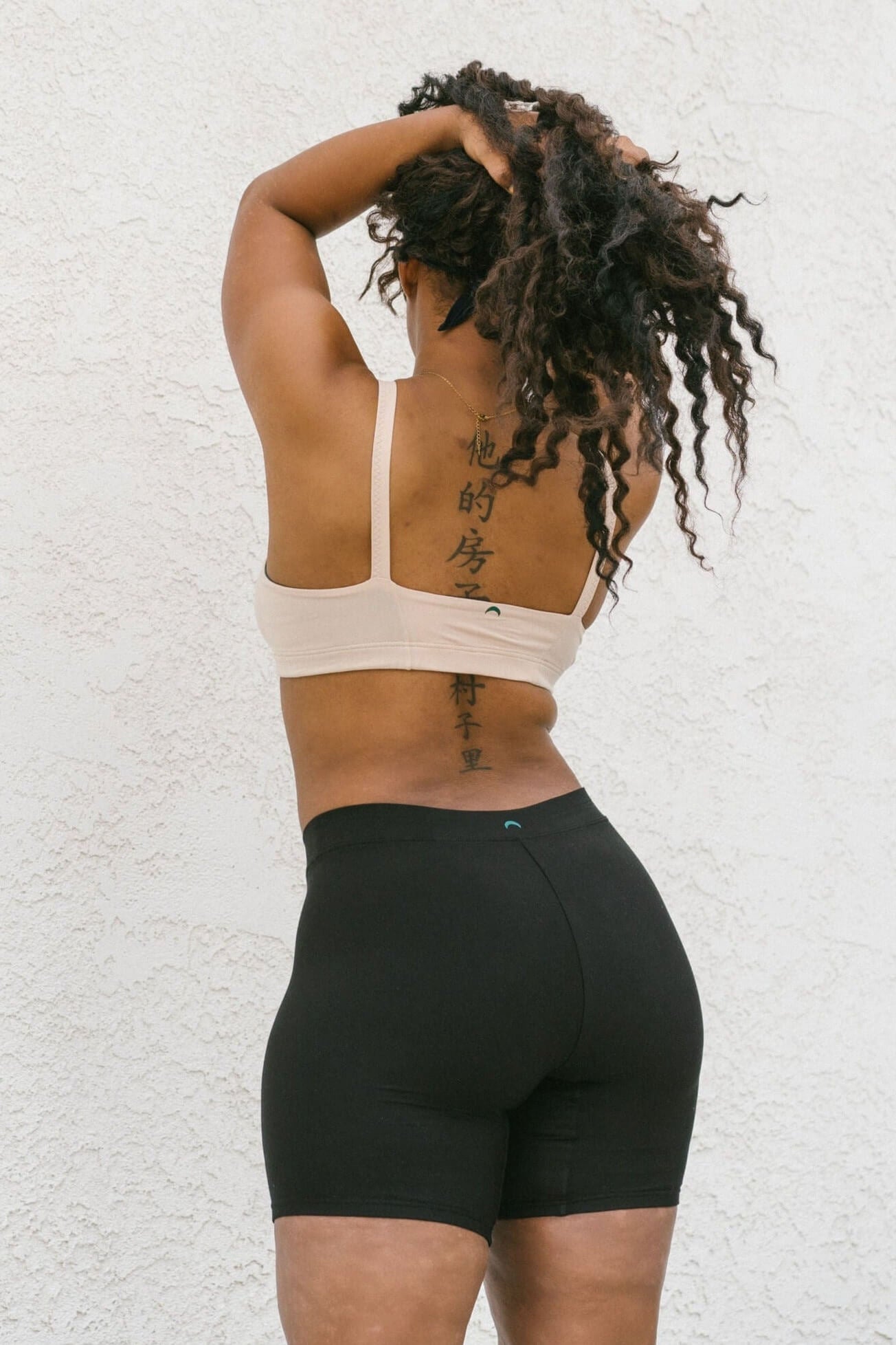 Black | Model is wearing size L