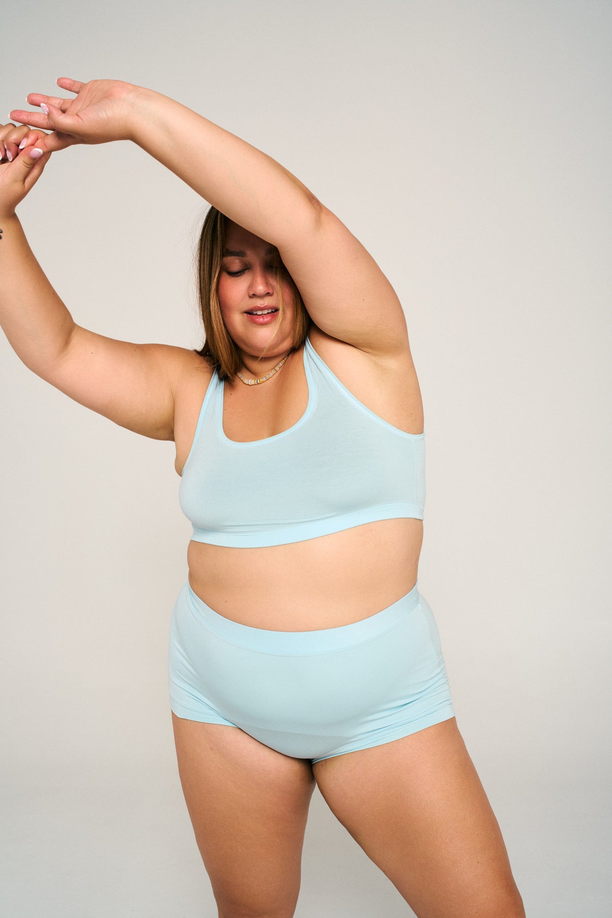 Plunge | Model is wearing size XL bra and 2XL undie