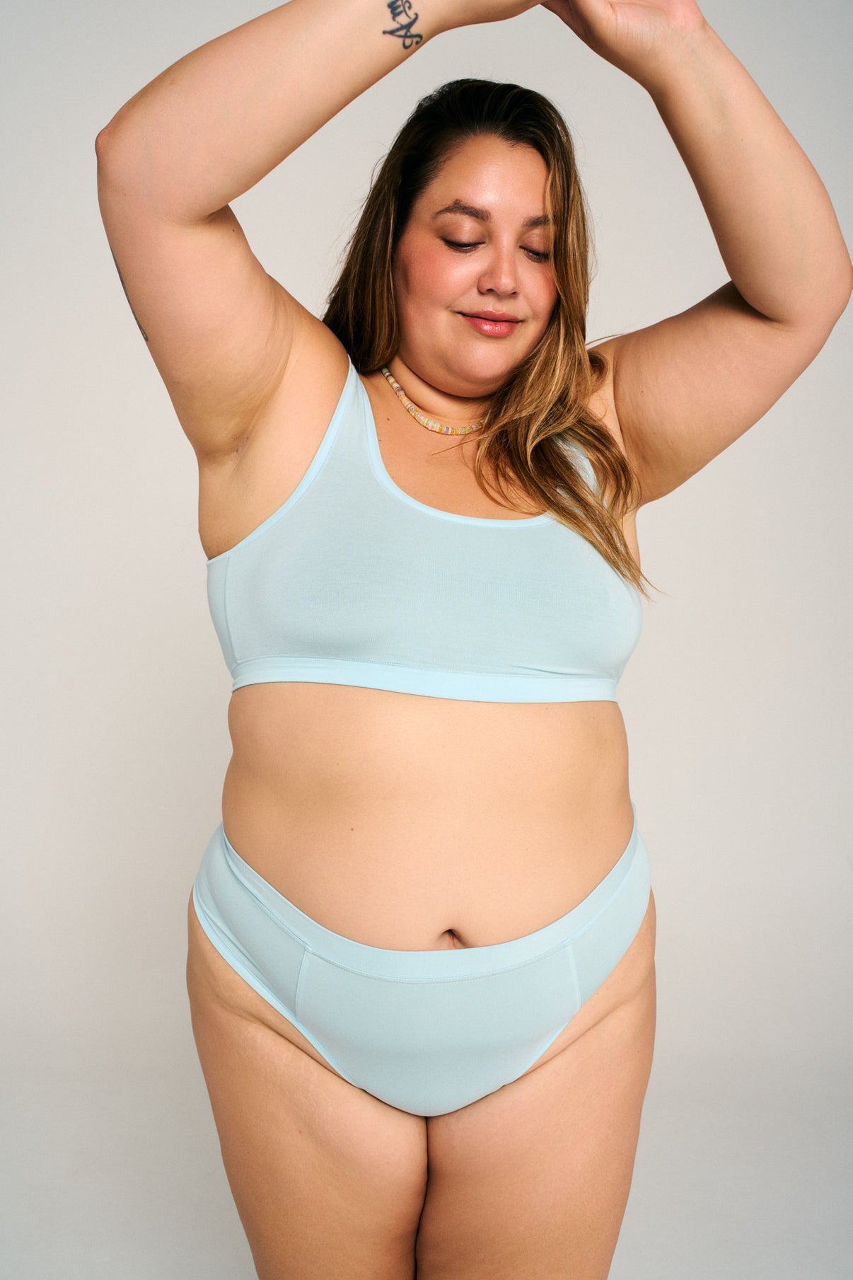 Plunge | Model is wearing size XL bra and 2XL undie