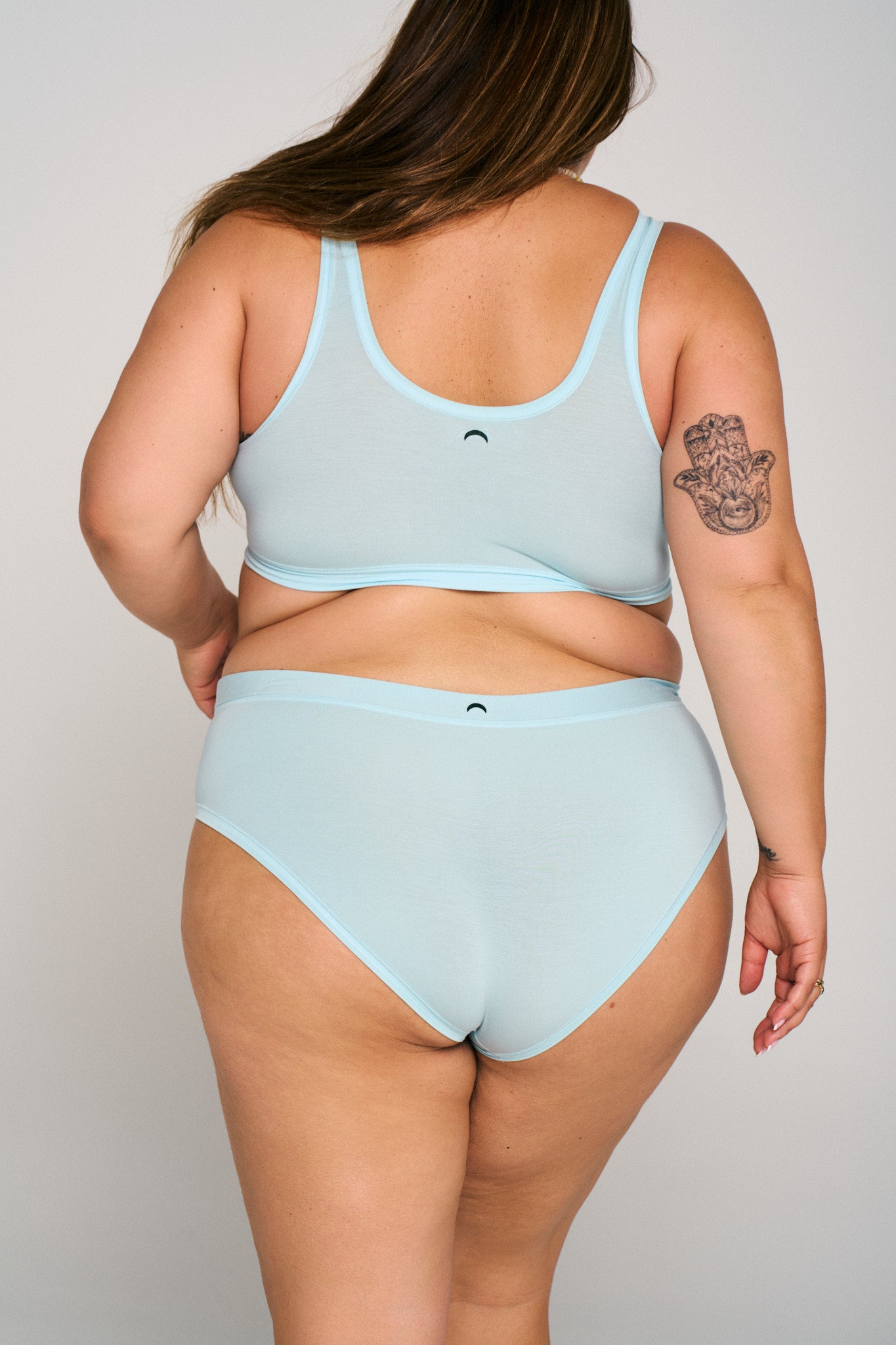 Plunge | Model is wearing size XL bra and 2XL undie