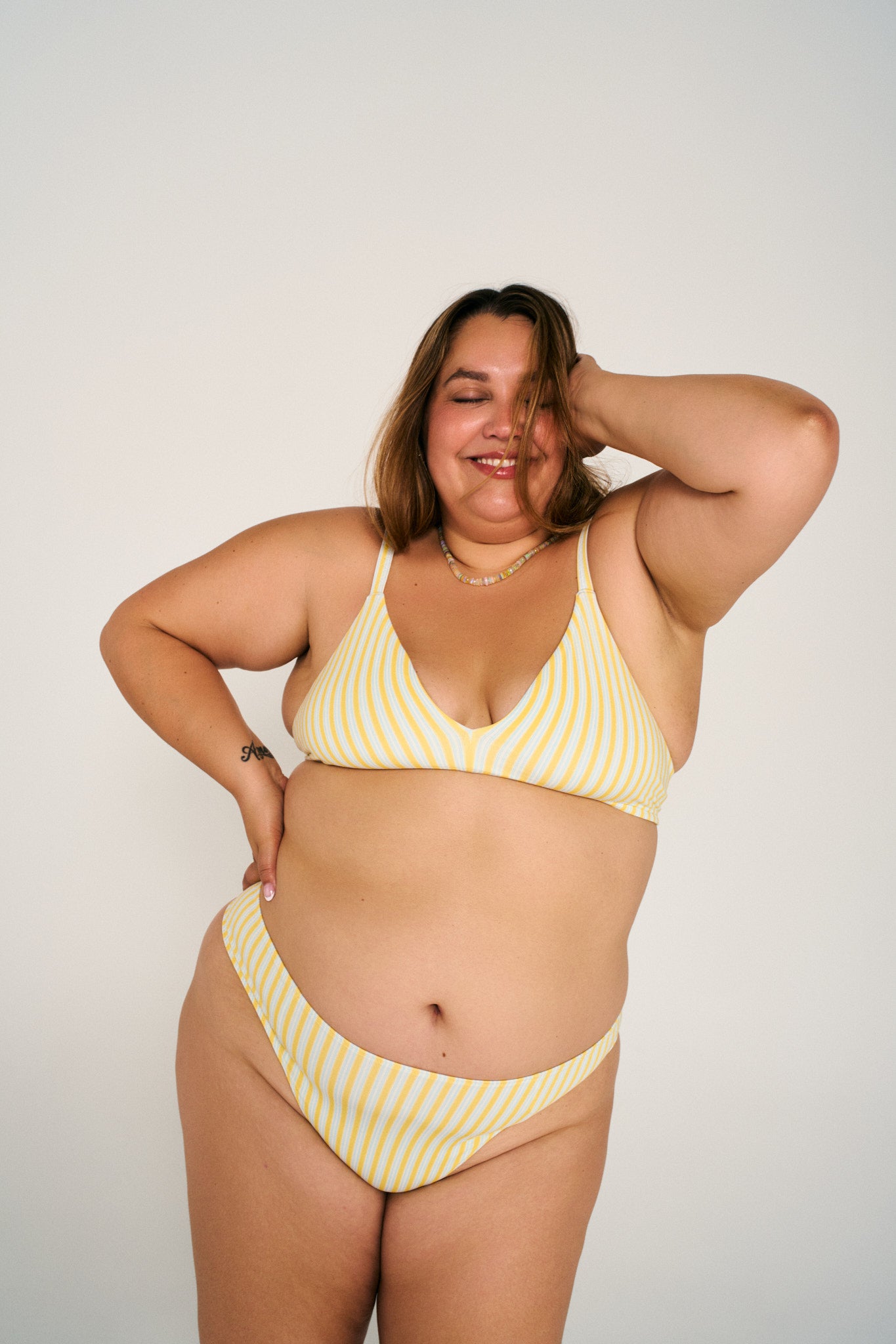 Riviera Stripe | Model is wearing size 2XL undie & XL bra