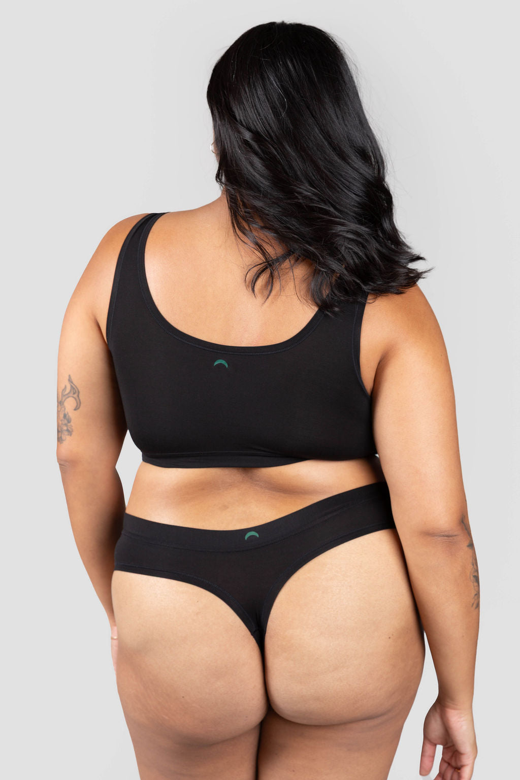 Black | Model is wearing size 2XL