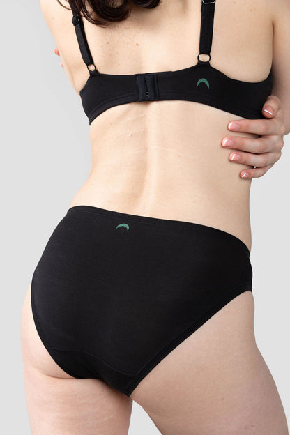 Black | Model is wearing size M