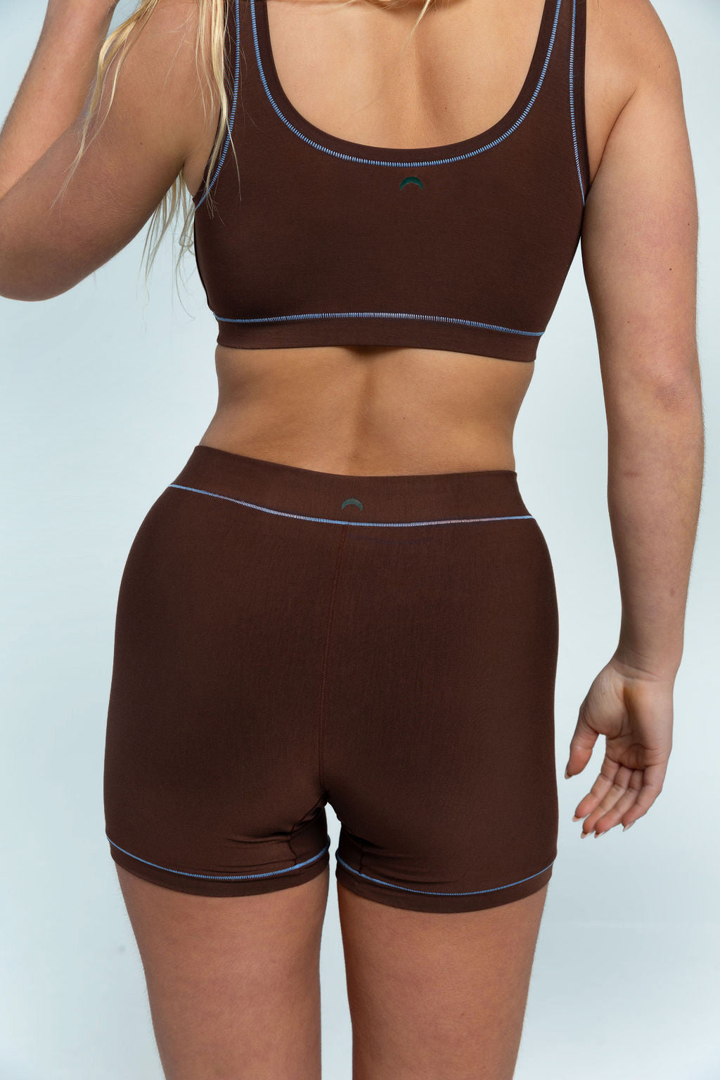 Brown / Sky Blue | Model is wearing size M