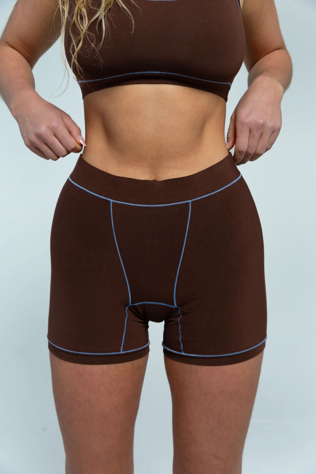 Brown / Sky Blue | Model is wearing size M