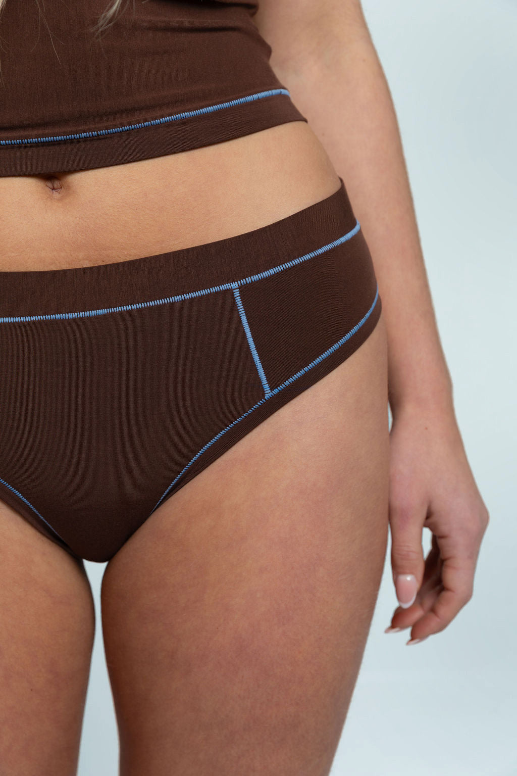 Brown / Sky Blue | Model is wearing size M