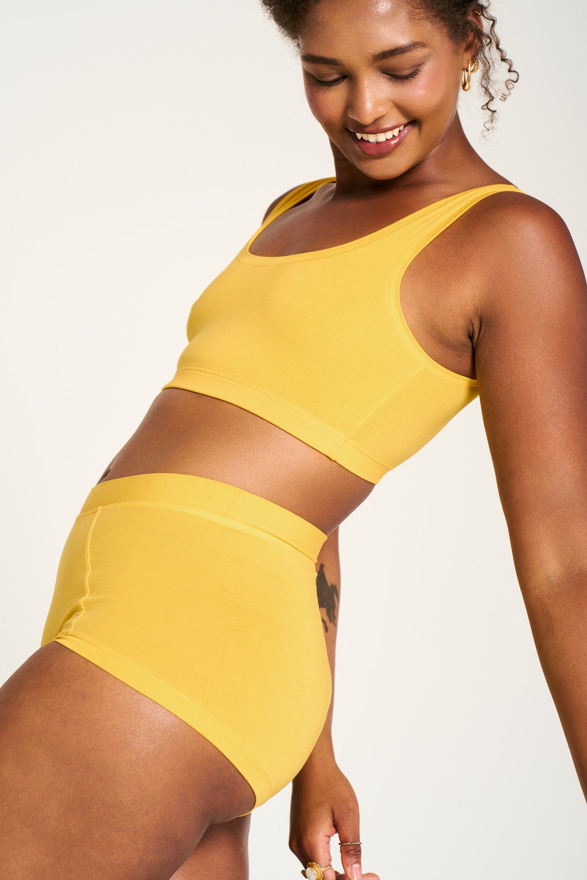 All Star Yellow | Model is wearing size L undie & M bra
