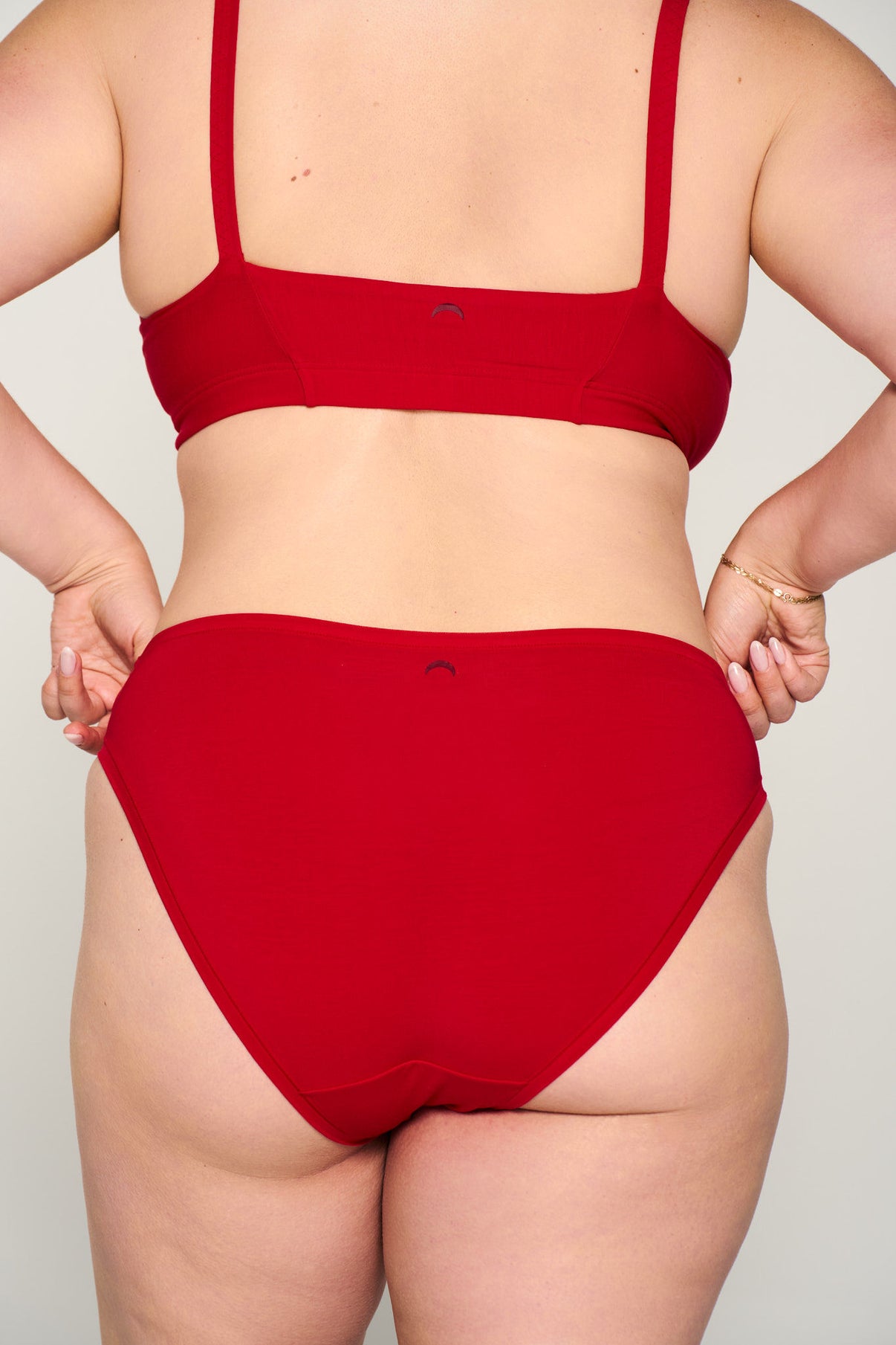Power Play Red | Model is wearing size XL undie & XL bra