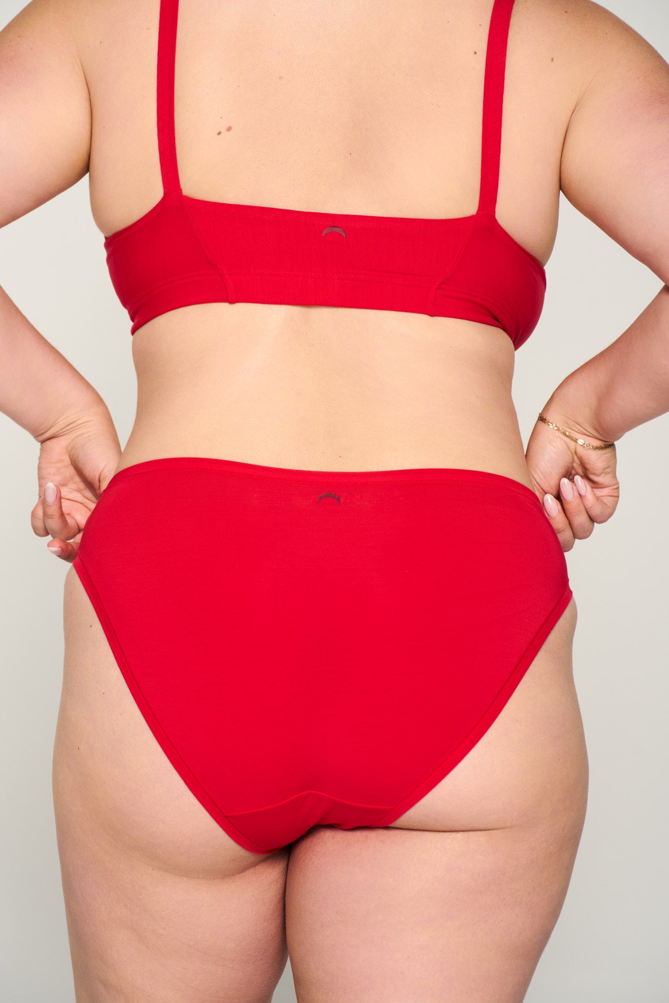 Power Play Red | Model is wearing size XL undie & XL bra