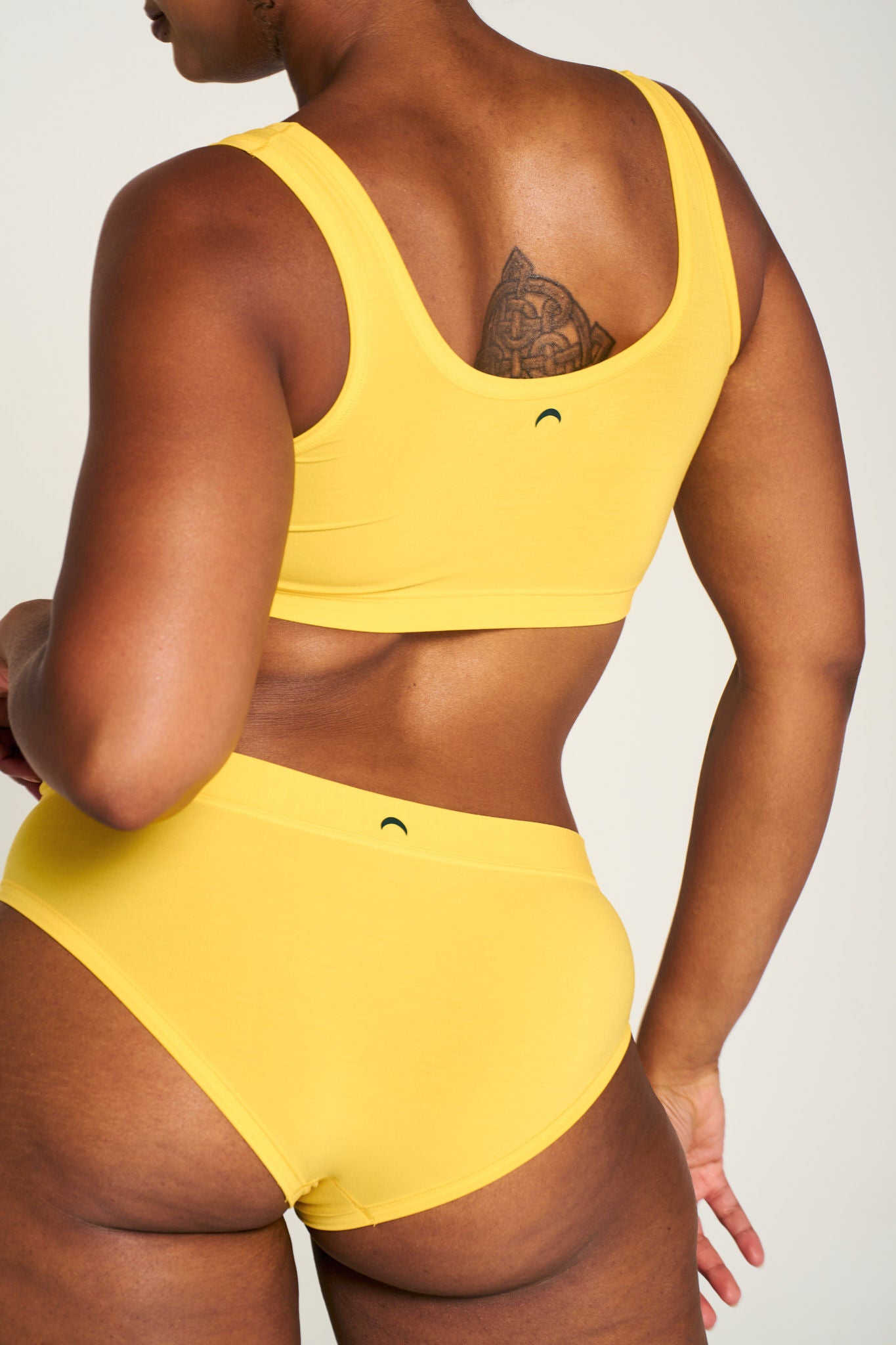 All Star Yellow | Model is wearing size L undie & M bra