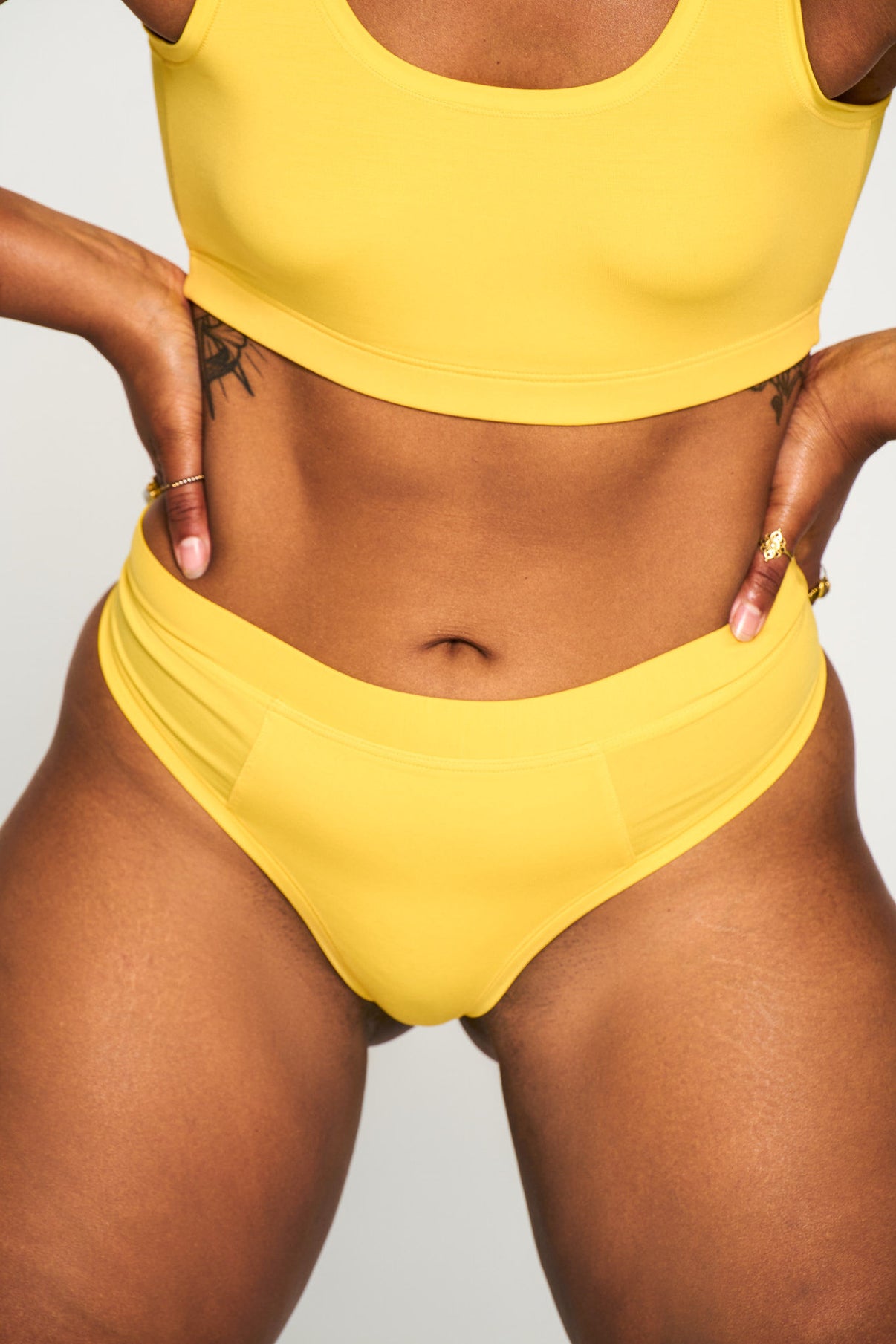 All Star Yellow | Model is wearing size L undie & M bra