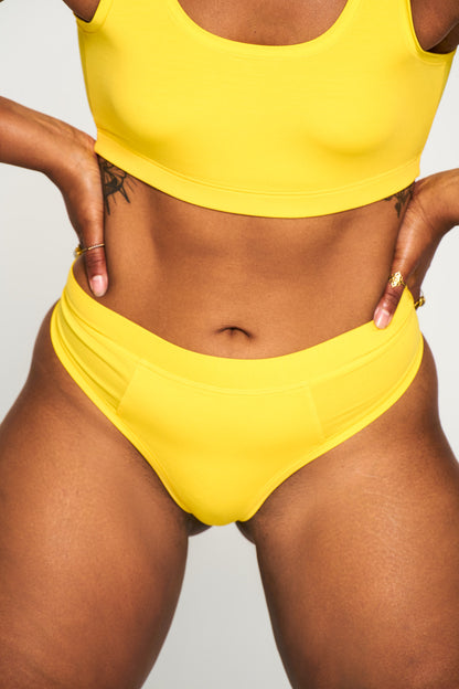 All Star Yellow | Model is wearing size L undie & M bra
