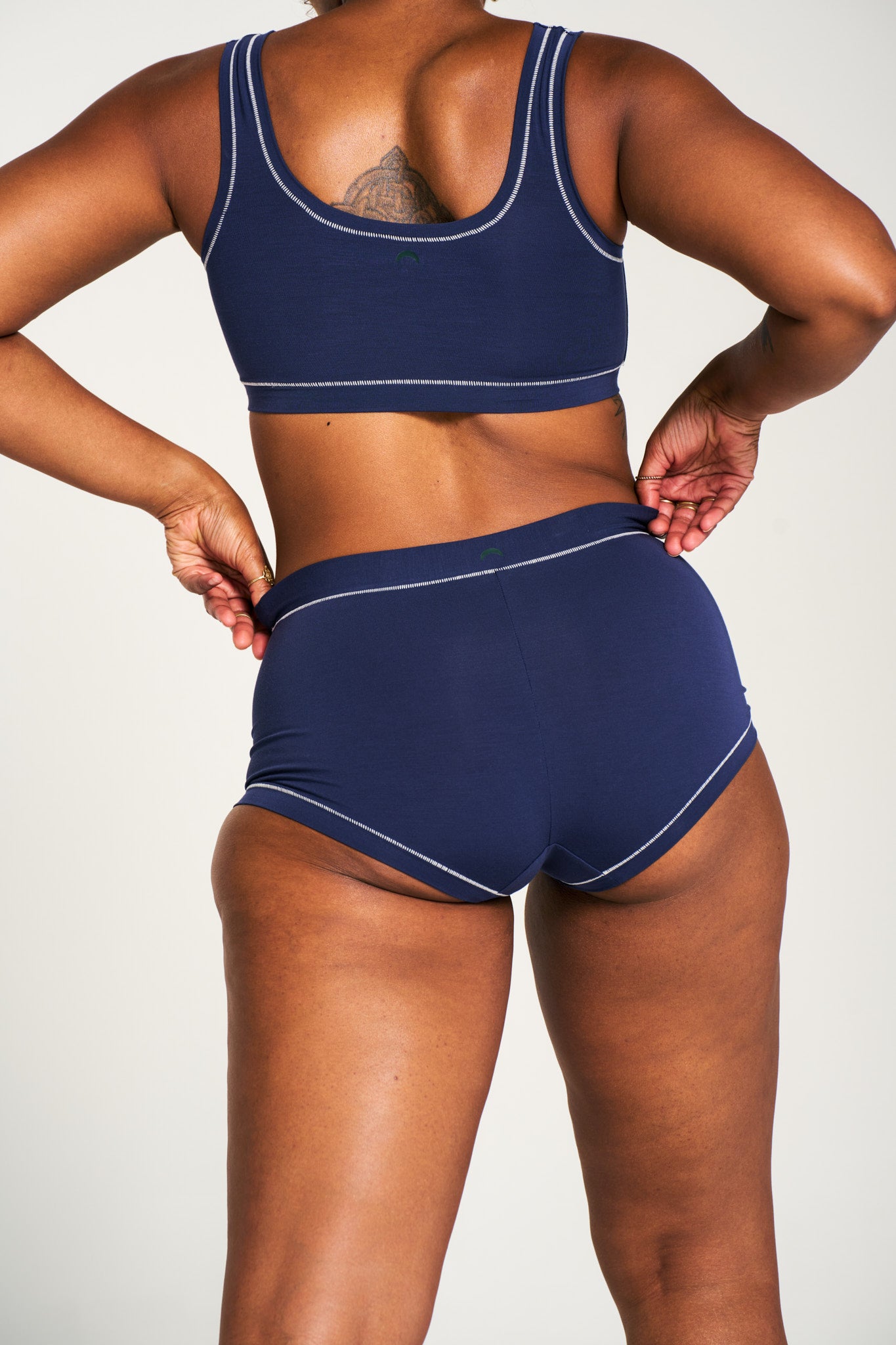 Navy / White | Model is wearing size L undie & M bra