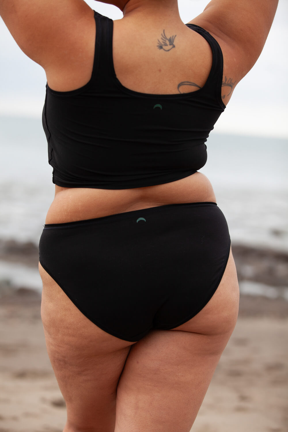 Black | Model is wearing size XL