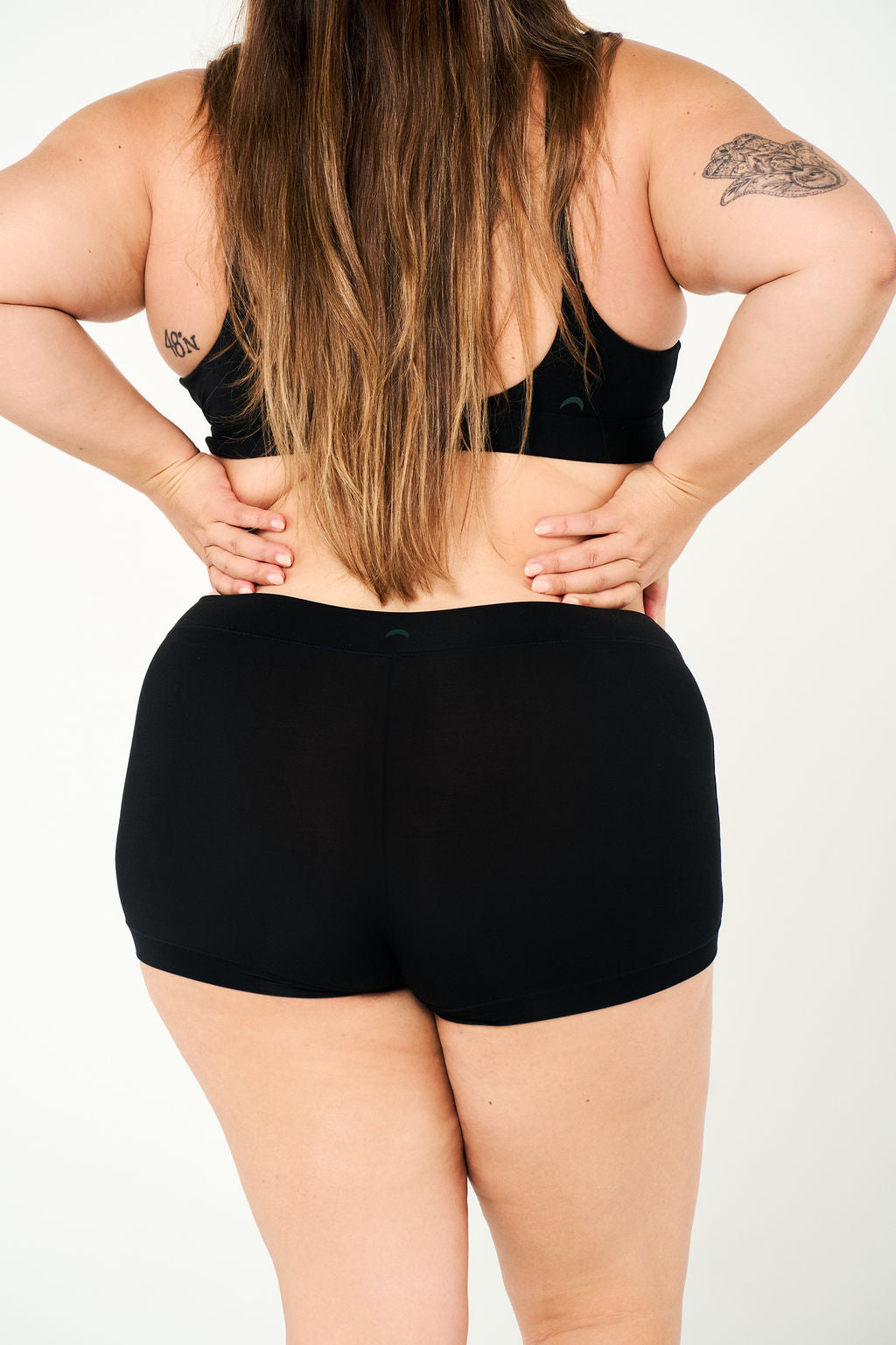 Black | Model is wearing size 2XL