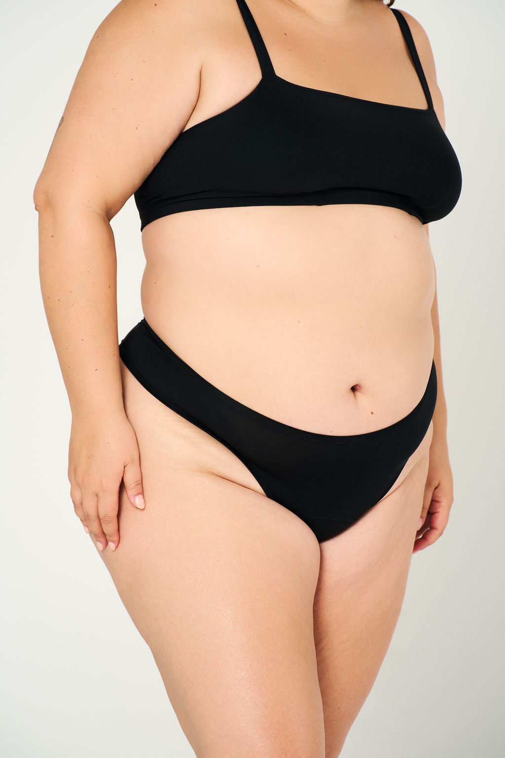 Black | Model is wearing size 2XL